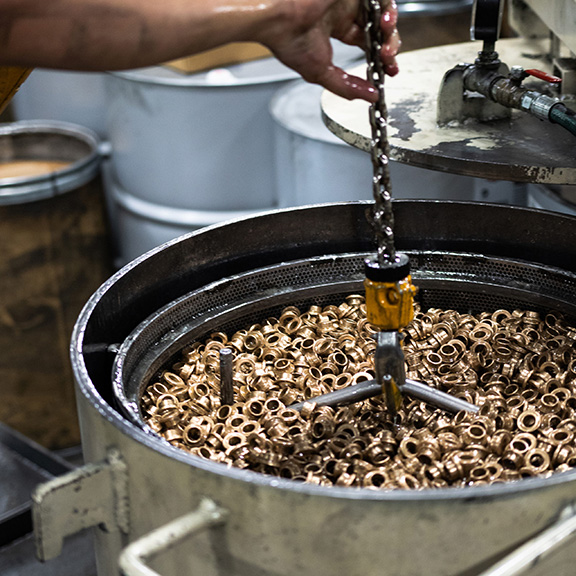 Bronze bearing getting oil impregnated.